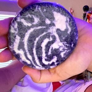 Purple swirl bath bomb